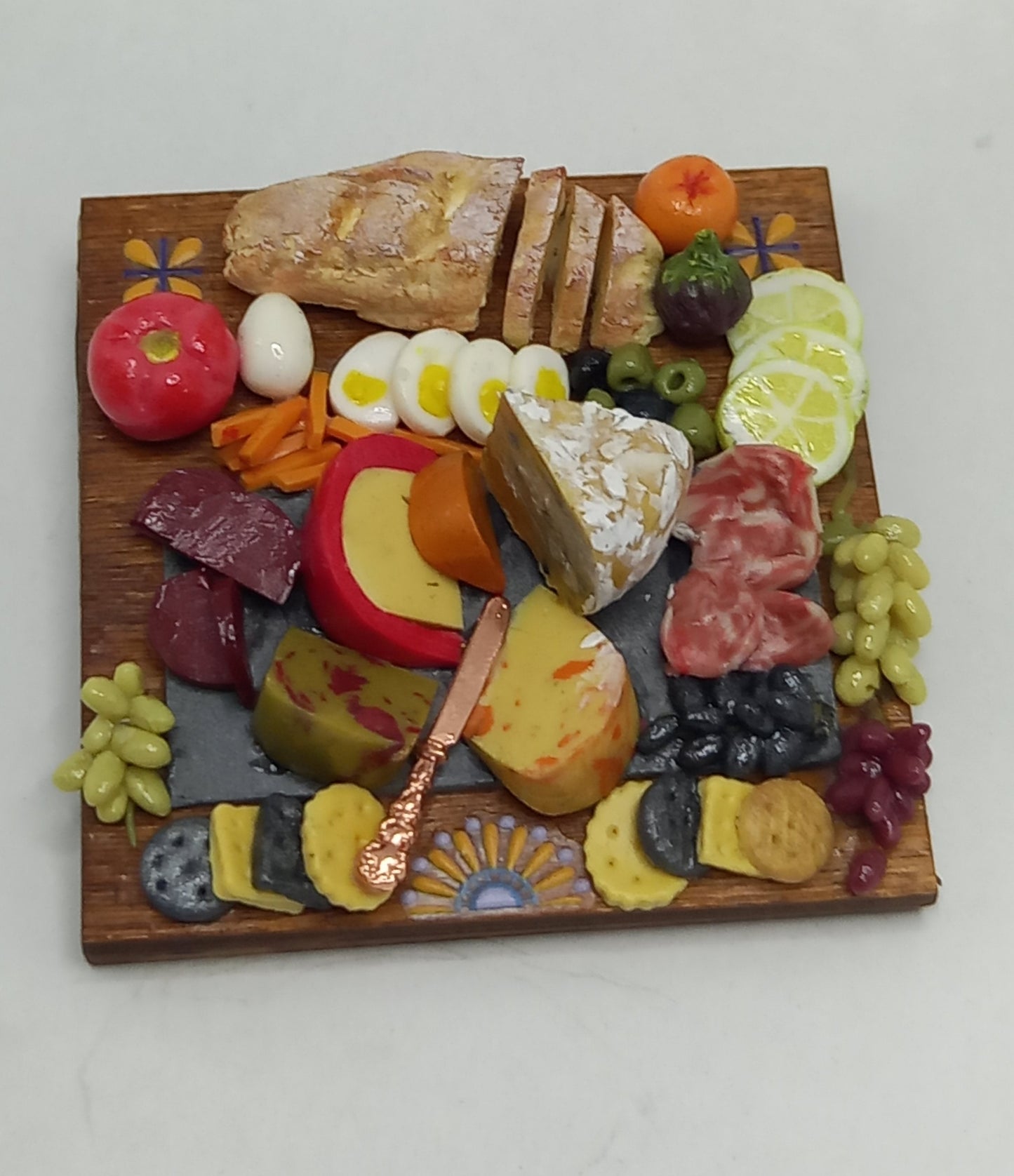 1:12 Scale Charcuterie selection on a wooden board, cheese ,meats, eggs, bread & crackers