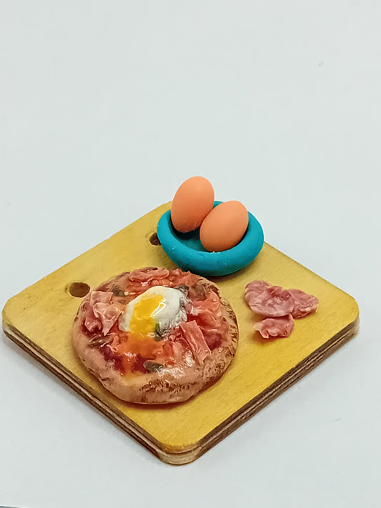 Pizza feast with egg and Spanish Jamon made from polymer clay on 5cm x 5cm wooden serving board.