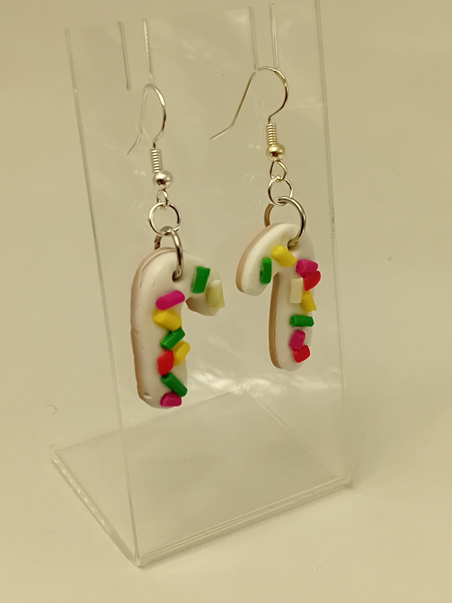 polymer clay version on iced biscuit Christmas cane