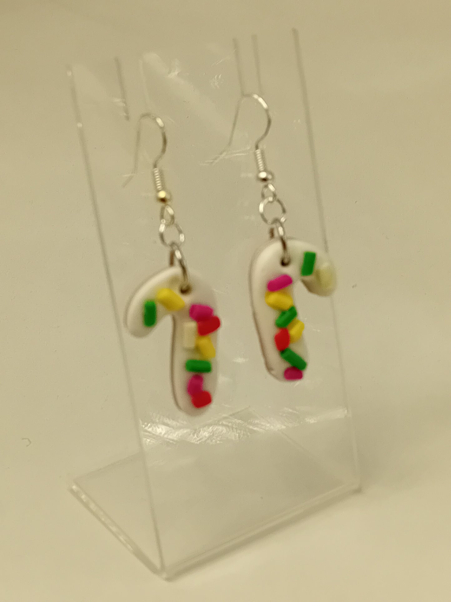 polymer clay version on iced biscuit Christmas cane