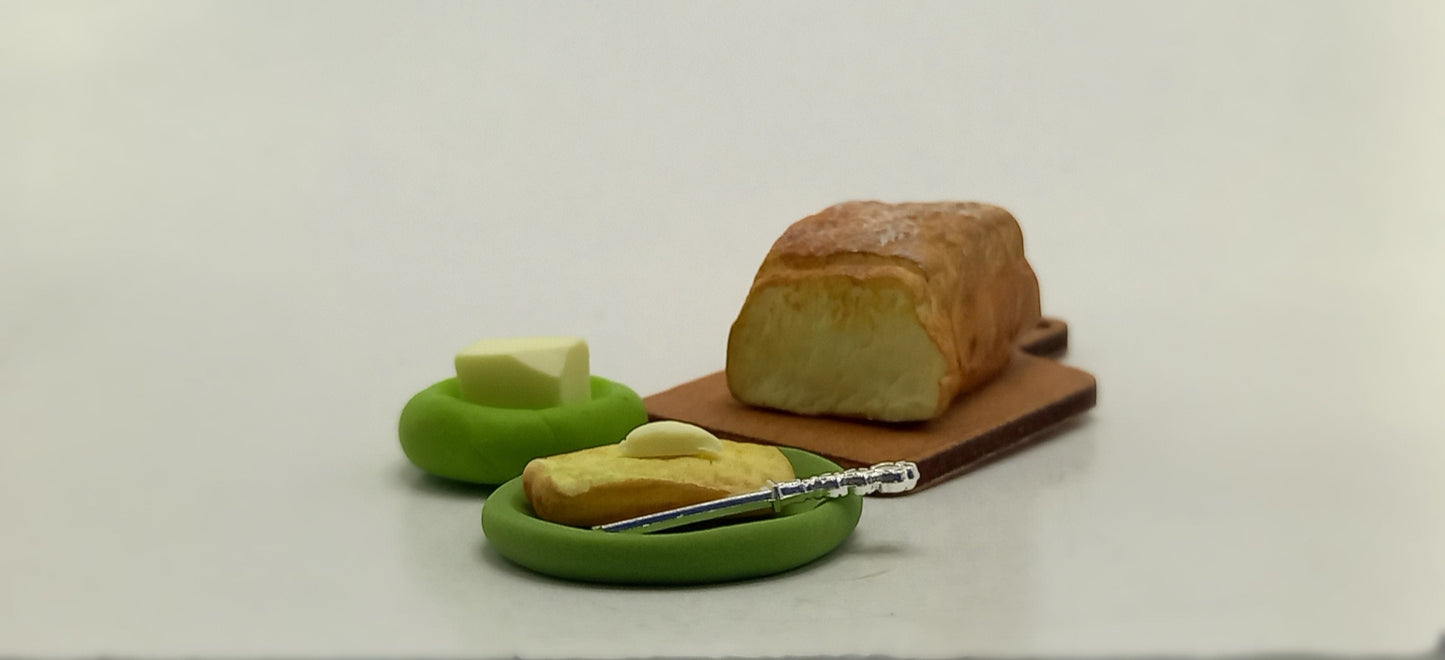 1:12 scale polymer miniature: Freshly baked polymer toast with butter. 8 pieces, not glued.