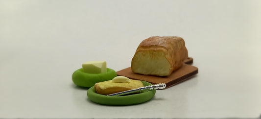 1:12 scale polymer miniature: Freshly baked polymer toast with butter. 8 pieces, not glued.